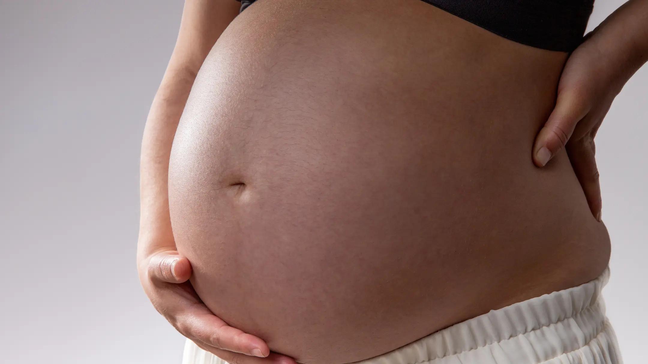 Lower Back Hurts During Pregnancy? Causes, Research, Relief & Treatment Options